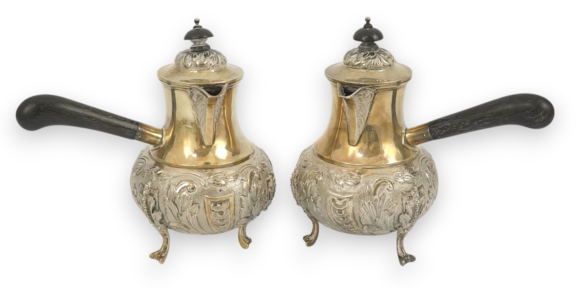 A pair of George V silver chocolate pots, by Goldsmiths & Silversmiths Co Ltd